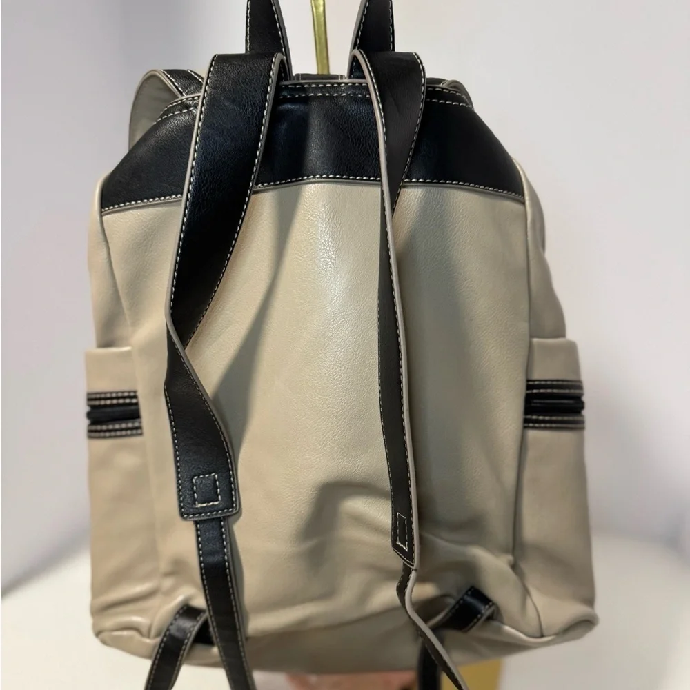 Stylish Tan and Black  Backpack purse in like new condition